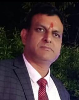 Dr A M Painuly