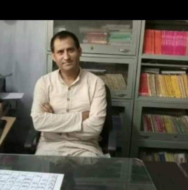 Dr Vijay Bahuguna